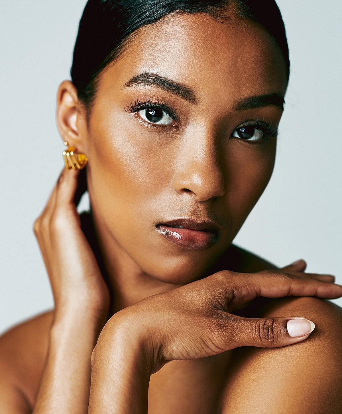 Close-up portrait of a woman with elegant features.