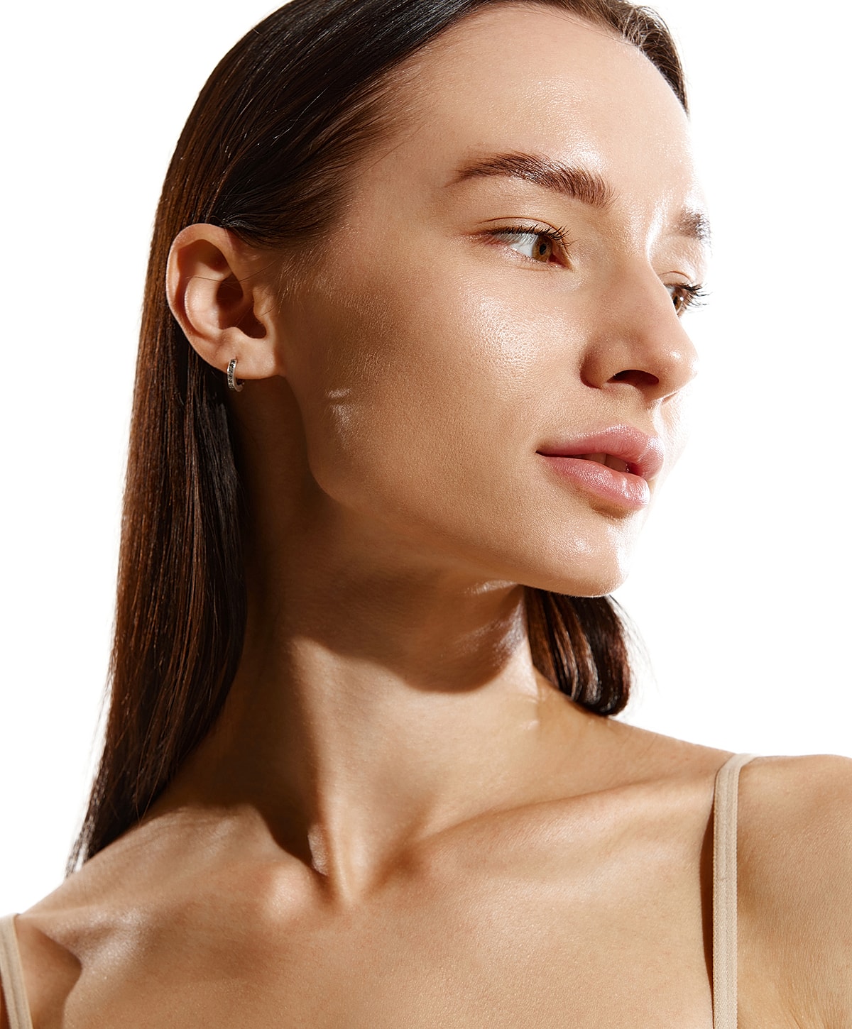 Portrait of a woman with glowing skin.